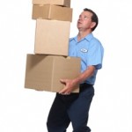 man carrying boxes